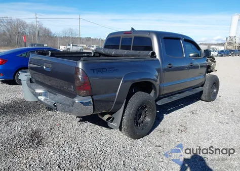 2015 Toyota Tacoma Base V6 z USA, uszkodzony, nr VIN 5TFLU4EN0FX133404